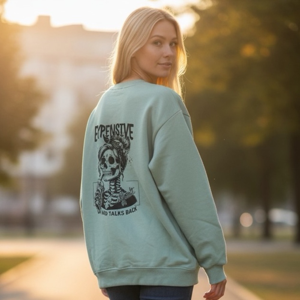 Like new. Turquoise Expensive & talks back sugar skull sweater oversized small